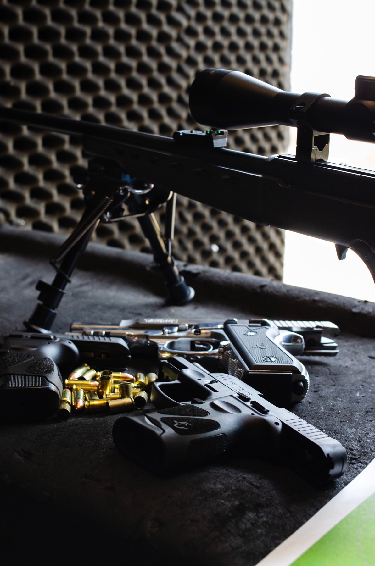 Brass and pistols on the bench